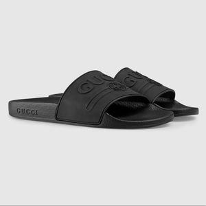 Black Gucci rubber slides